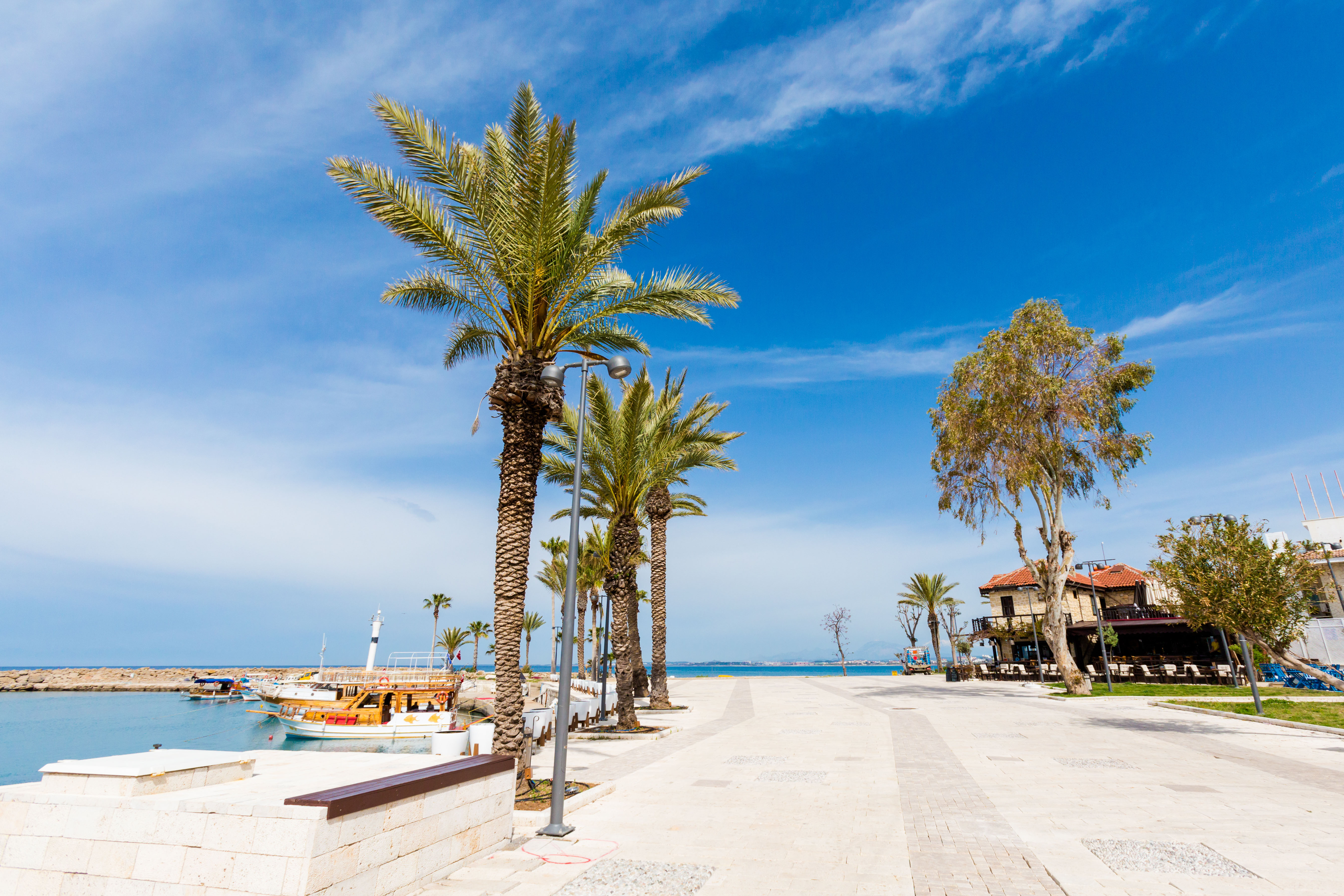 ancient Side harbour in Antalya with beach beyond