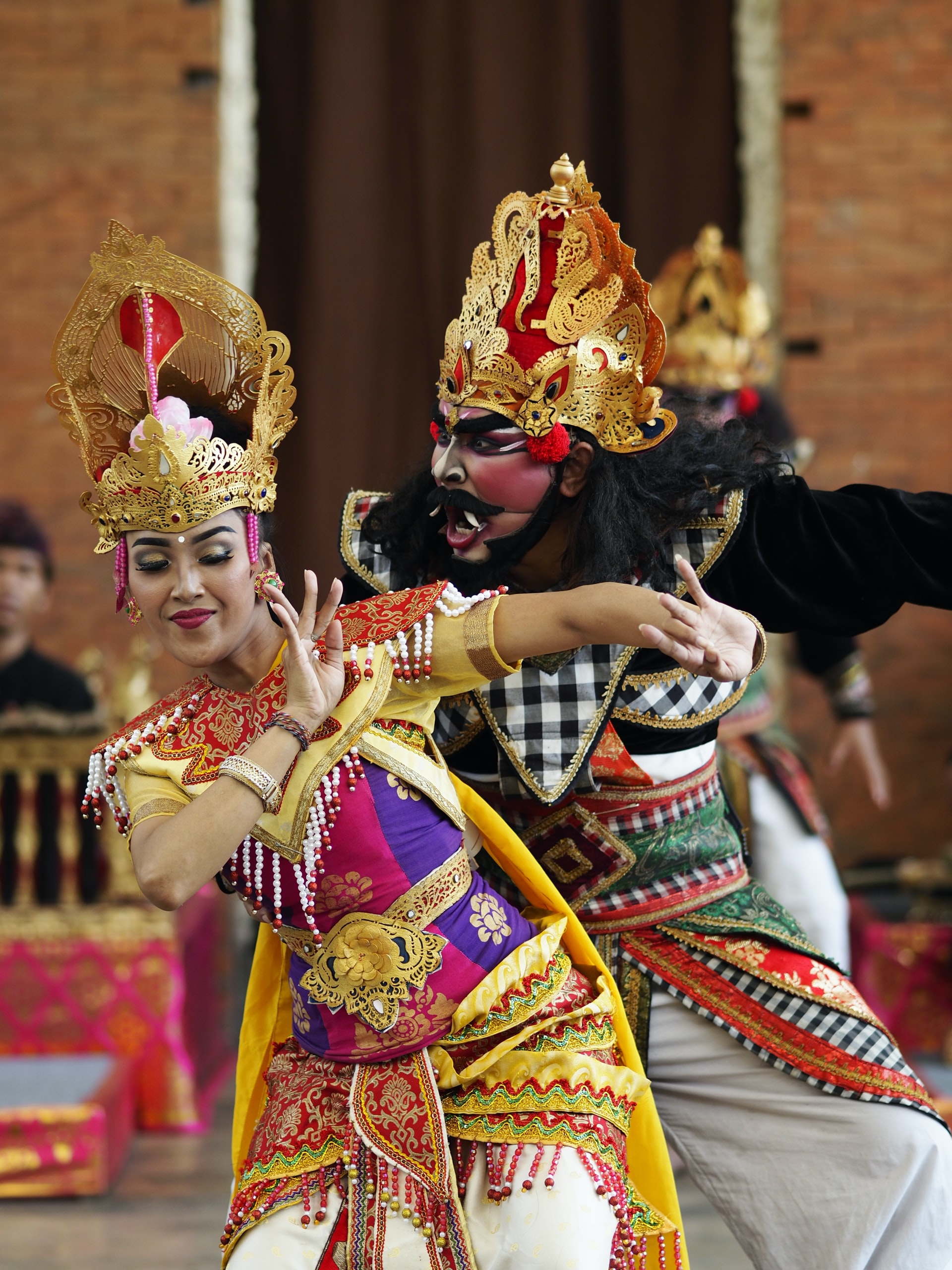 Man and woman dancing with traditional costumes