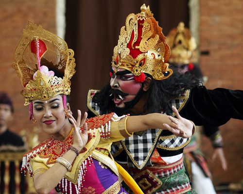 Man and woman dancing with traditional costumes