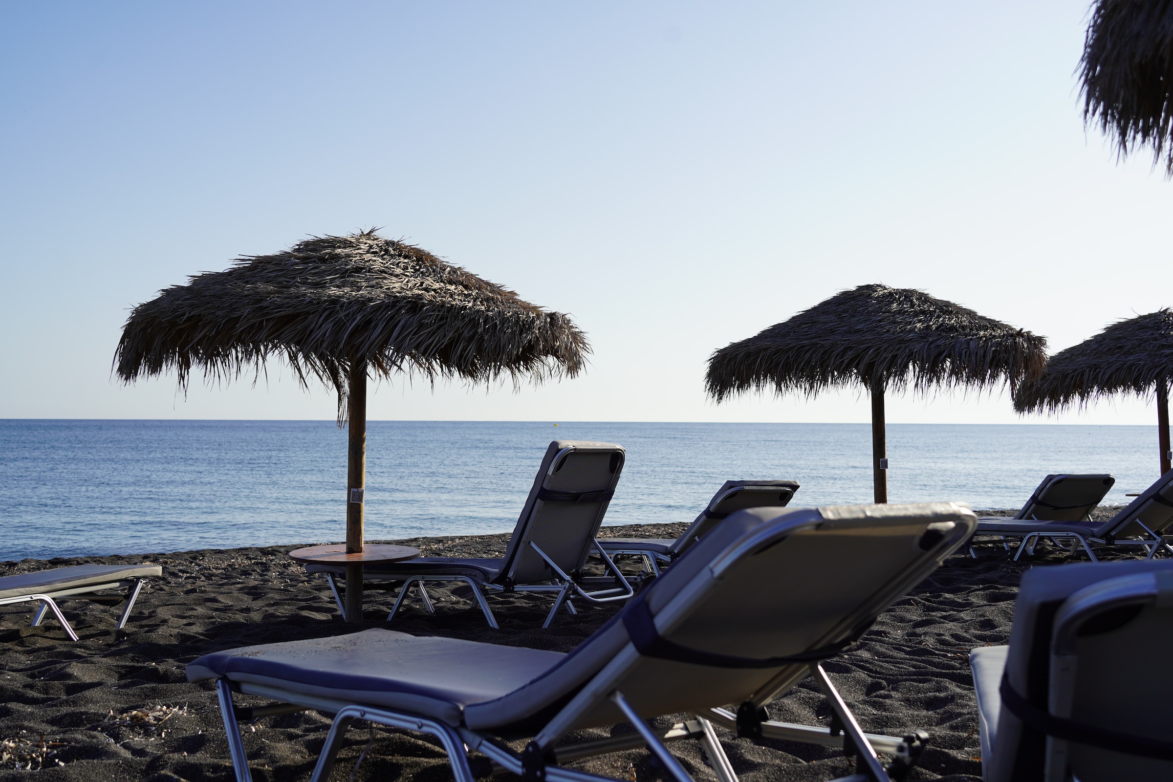 Parasols and sunbeds on the beach