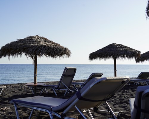 Parasols and sunbeds on the beach