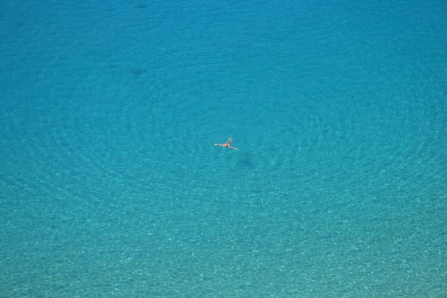Swimmer laying in the Caribbean Sea