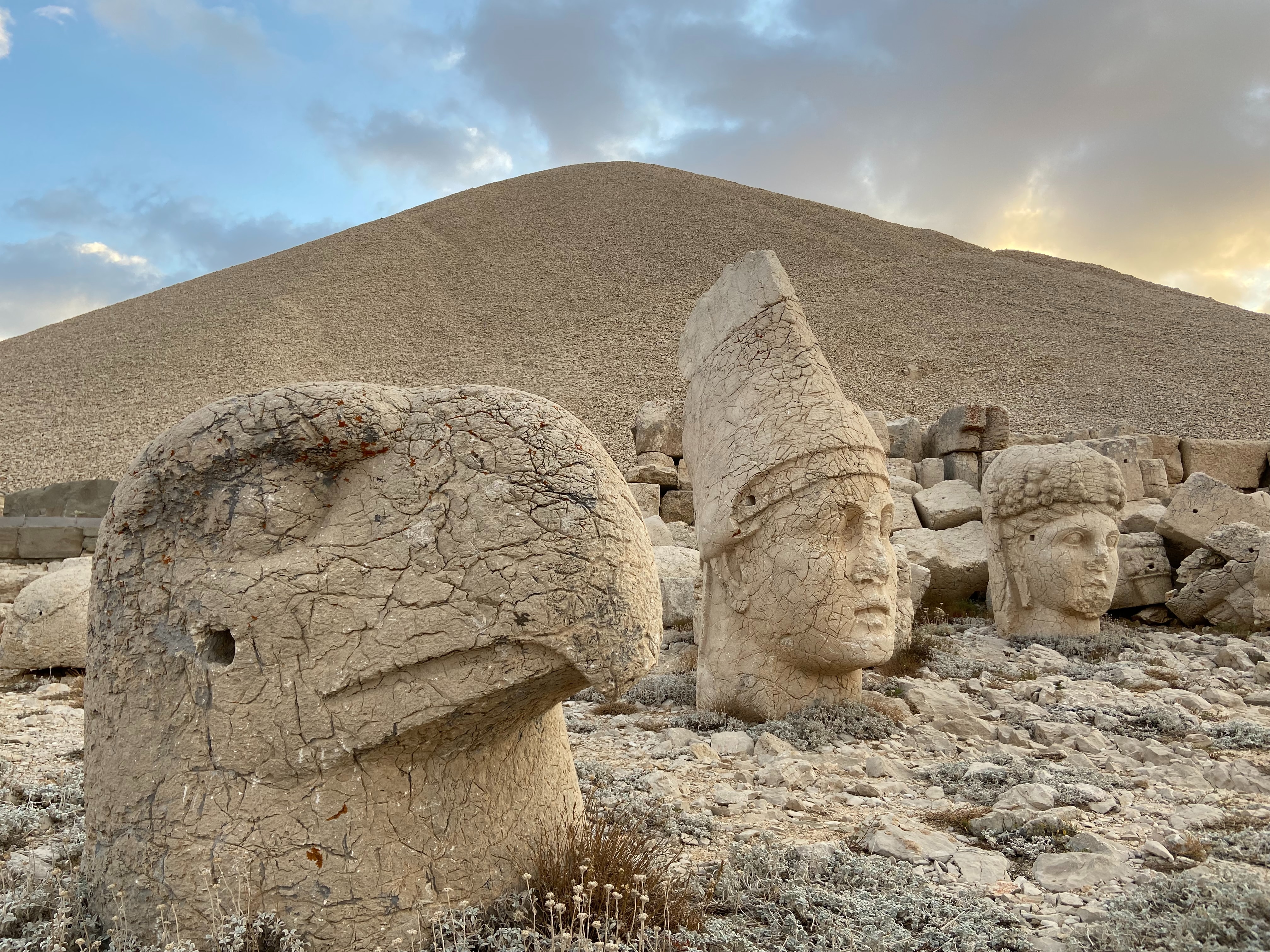 Stone Statue heads on rocky grounds