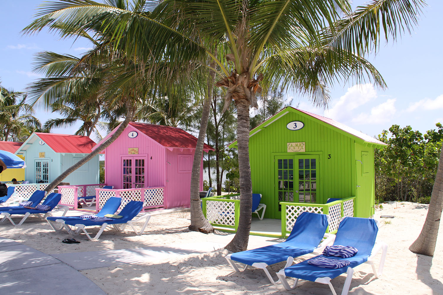 Colourful beach huts on the beach in the Bahamas