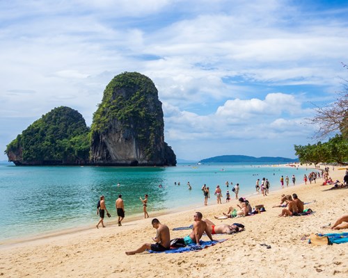 People sunbathing on Railay Beach