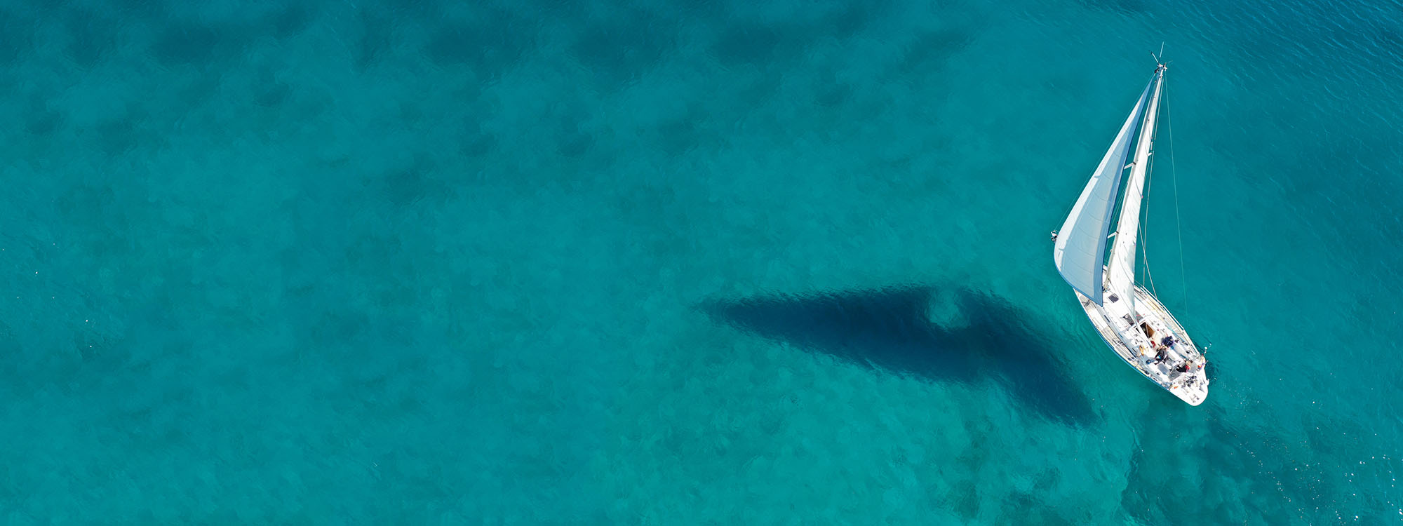 Aerial view of sailing boat in tropical exotic water