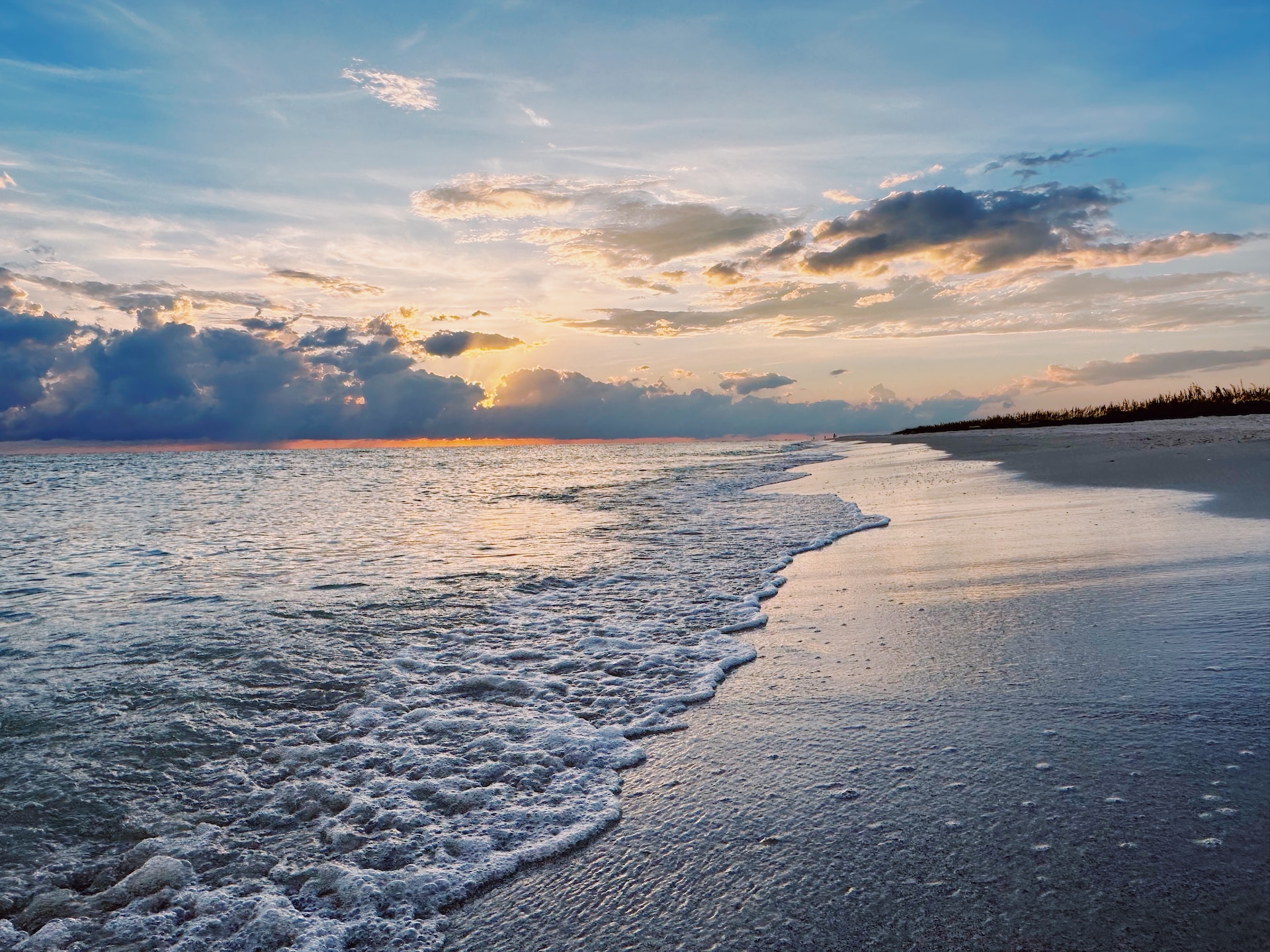 Generic beach image with waves gushing on the shore