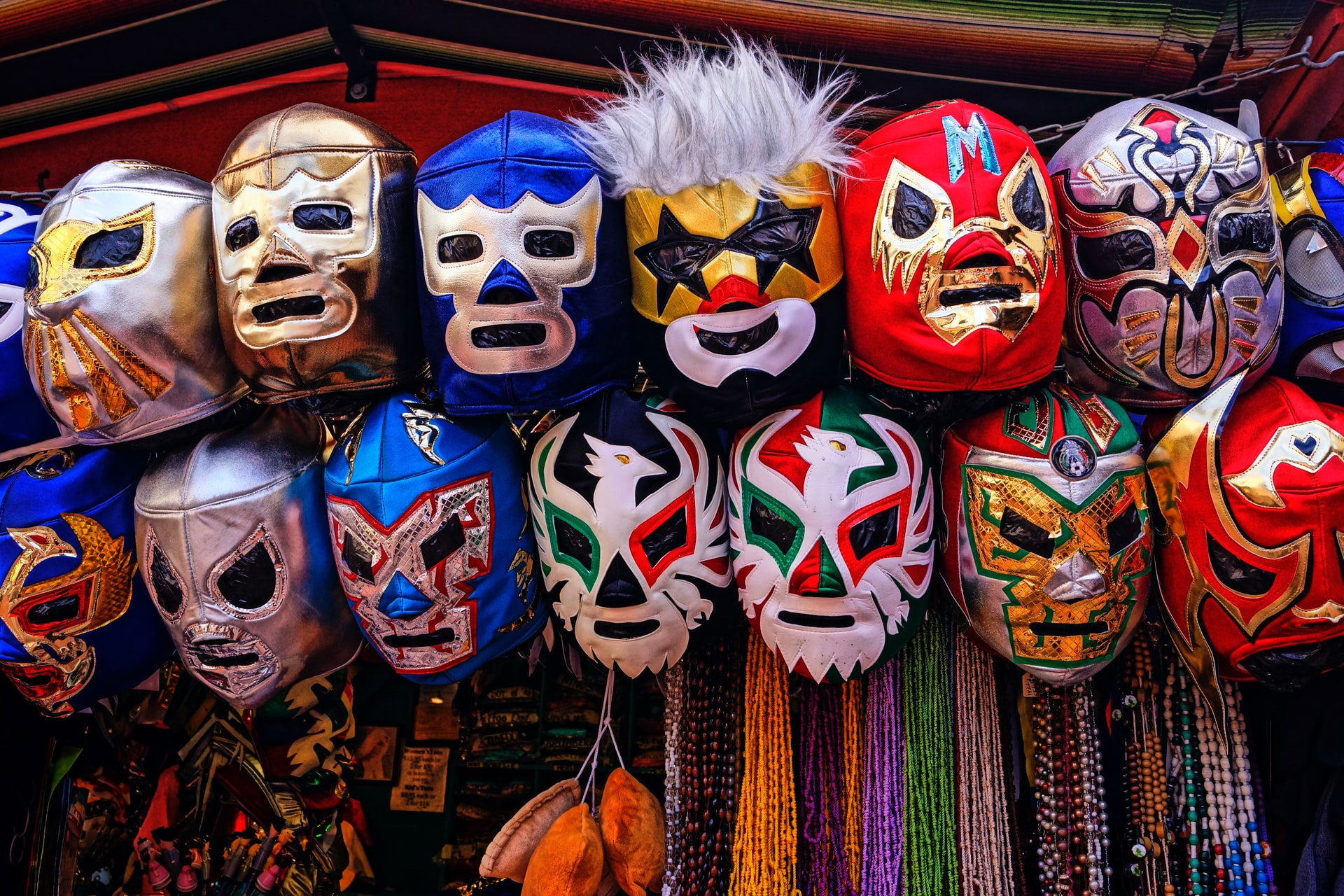 Colourful lucha libre Mexican masks on a market stall