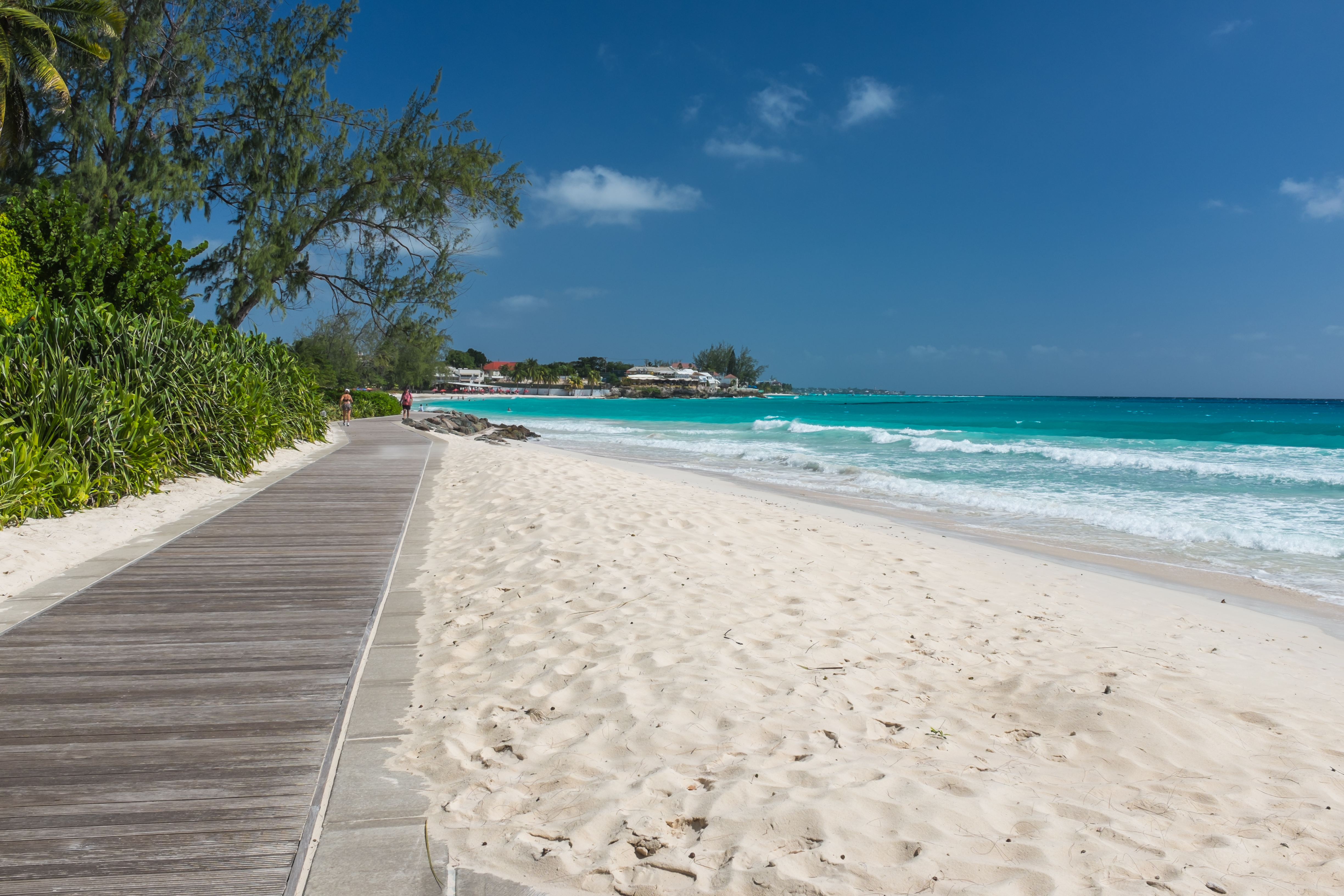 Boardwalk along white sand beach