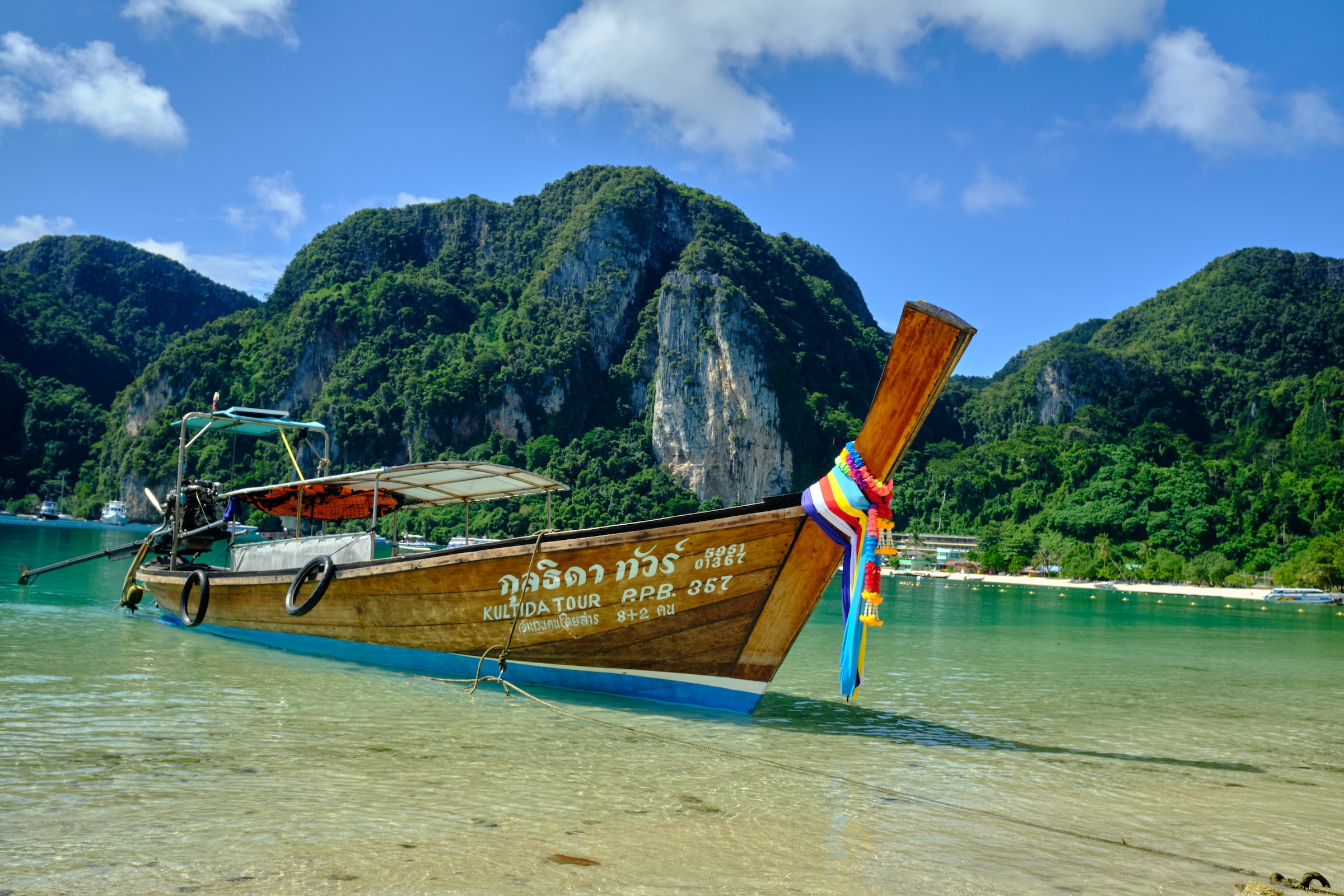 A long tail boat docked on Maya Bay