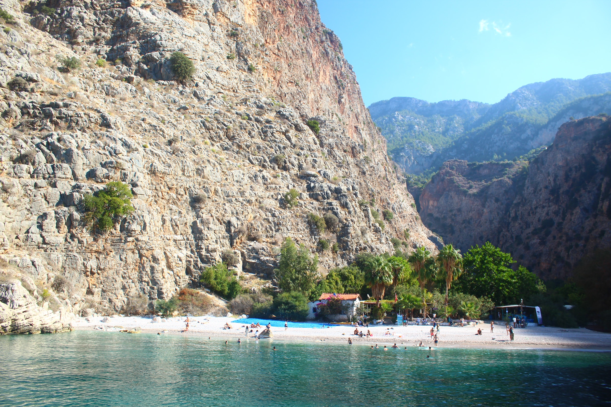 People relaxing on Butterfly Valley