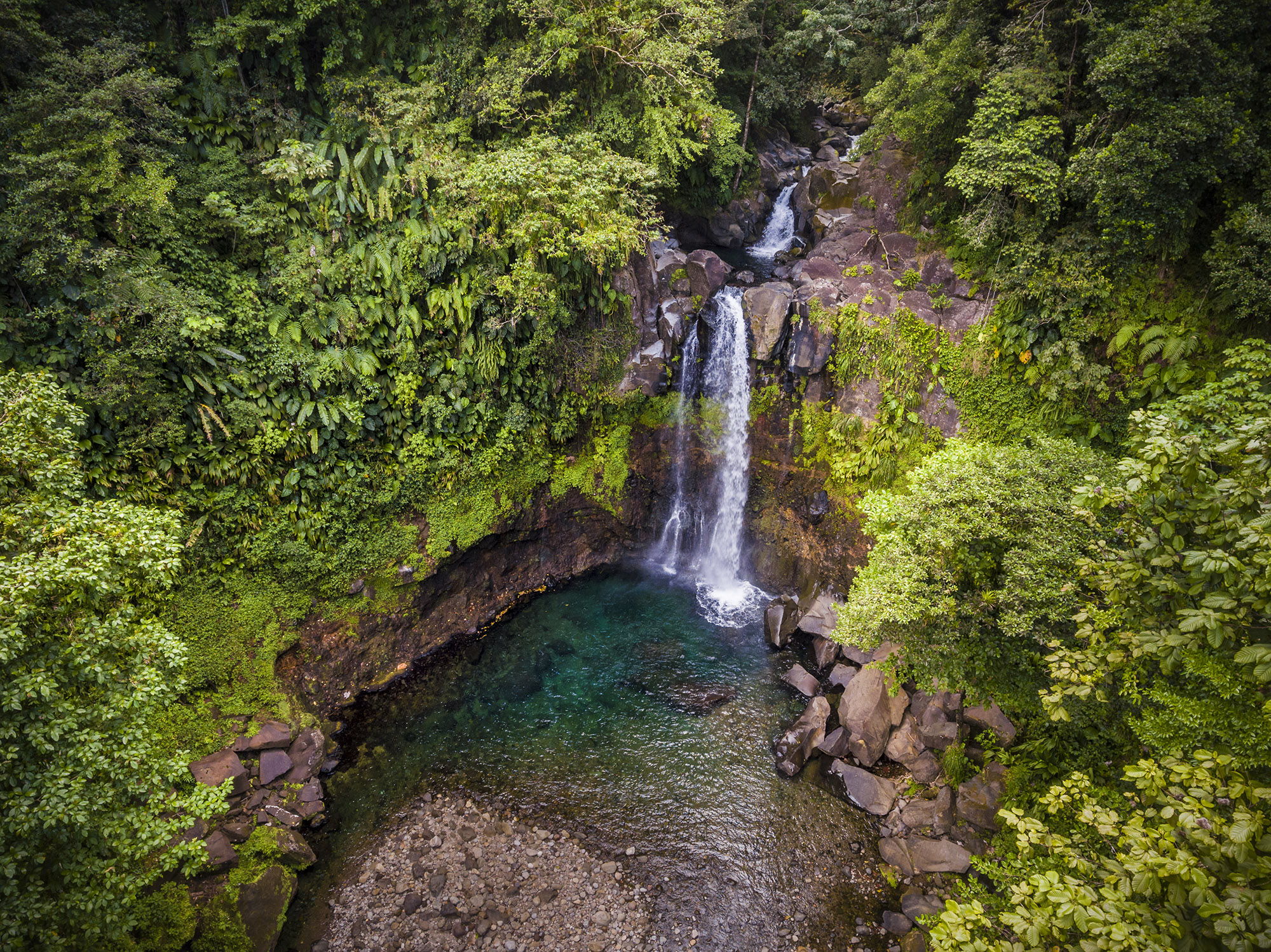 Aerial view of Chute Du Carbet waterfall in the middle of thick jungle