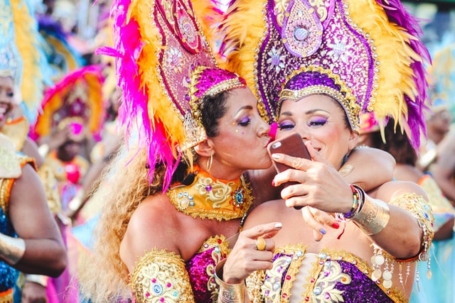 2 women in colourful festival costumes
