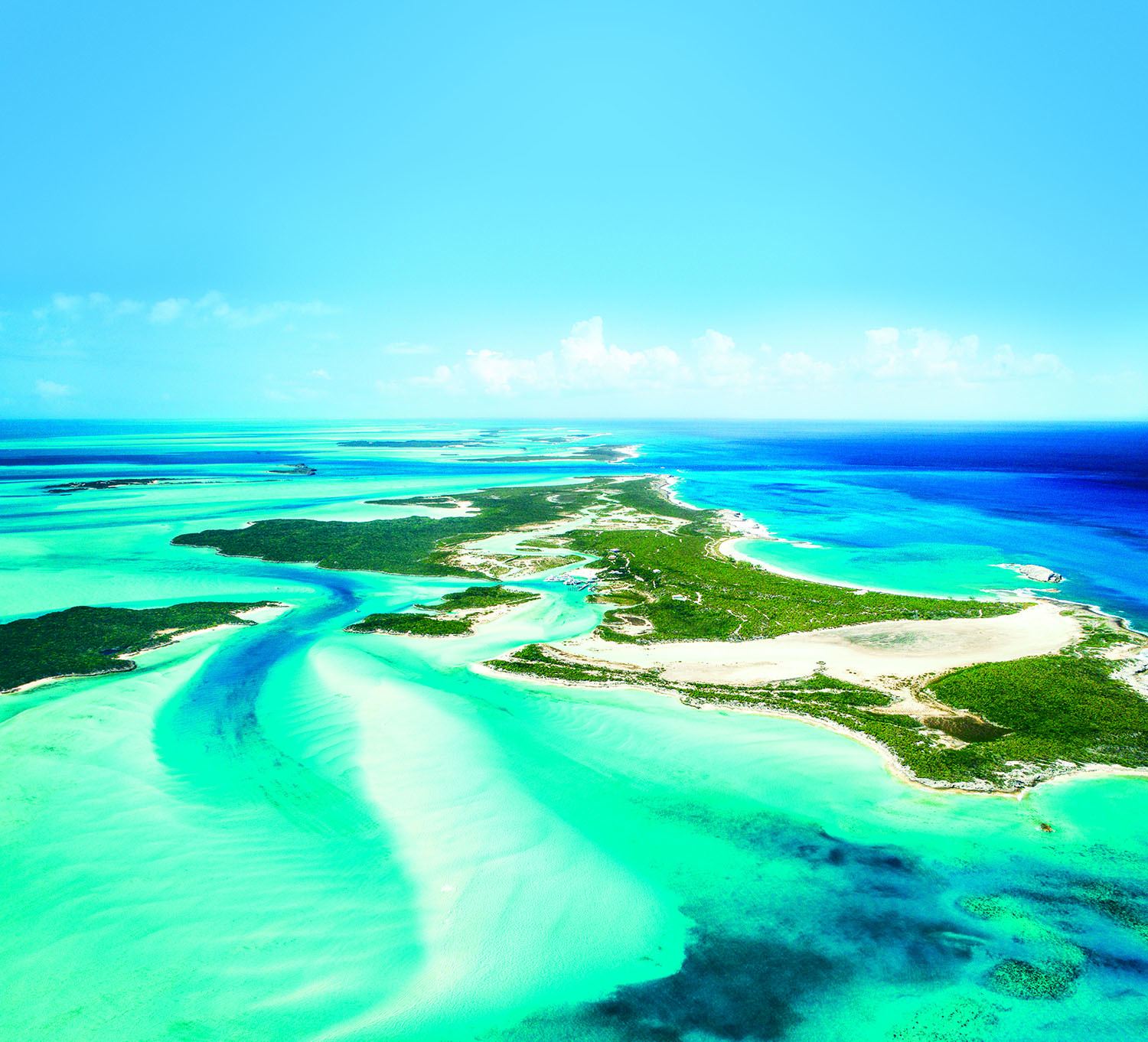 Aerial view of tropical islands and azure waters