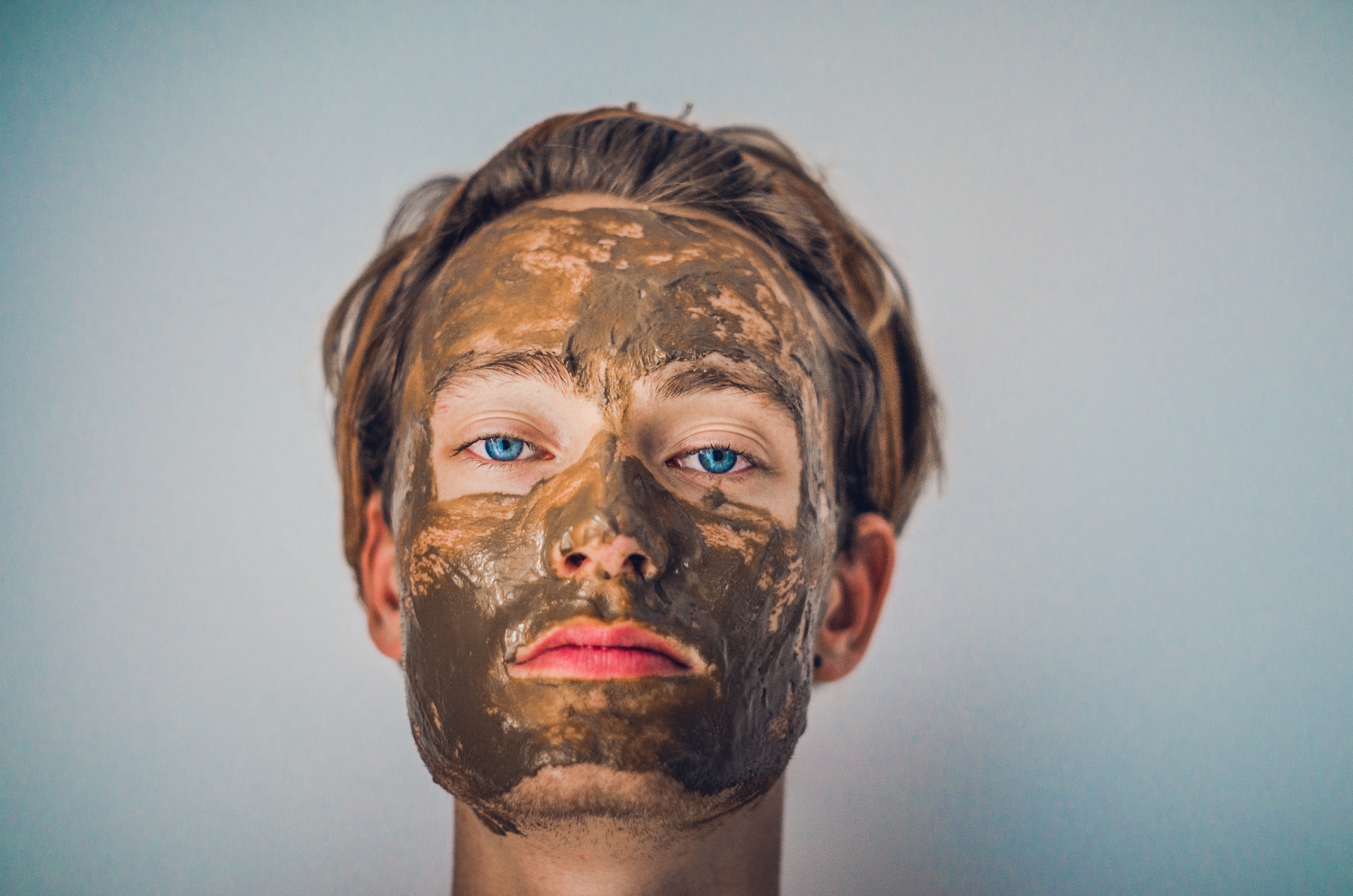 A face covered in a mineral mud mask