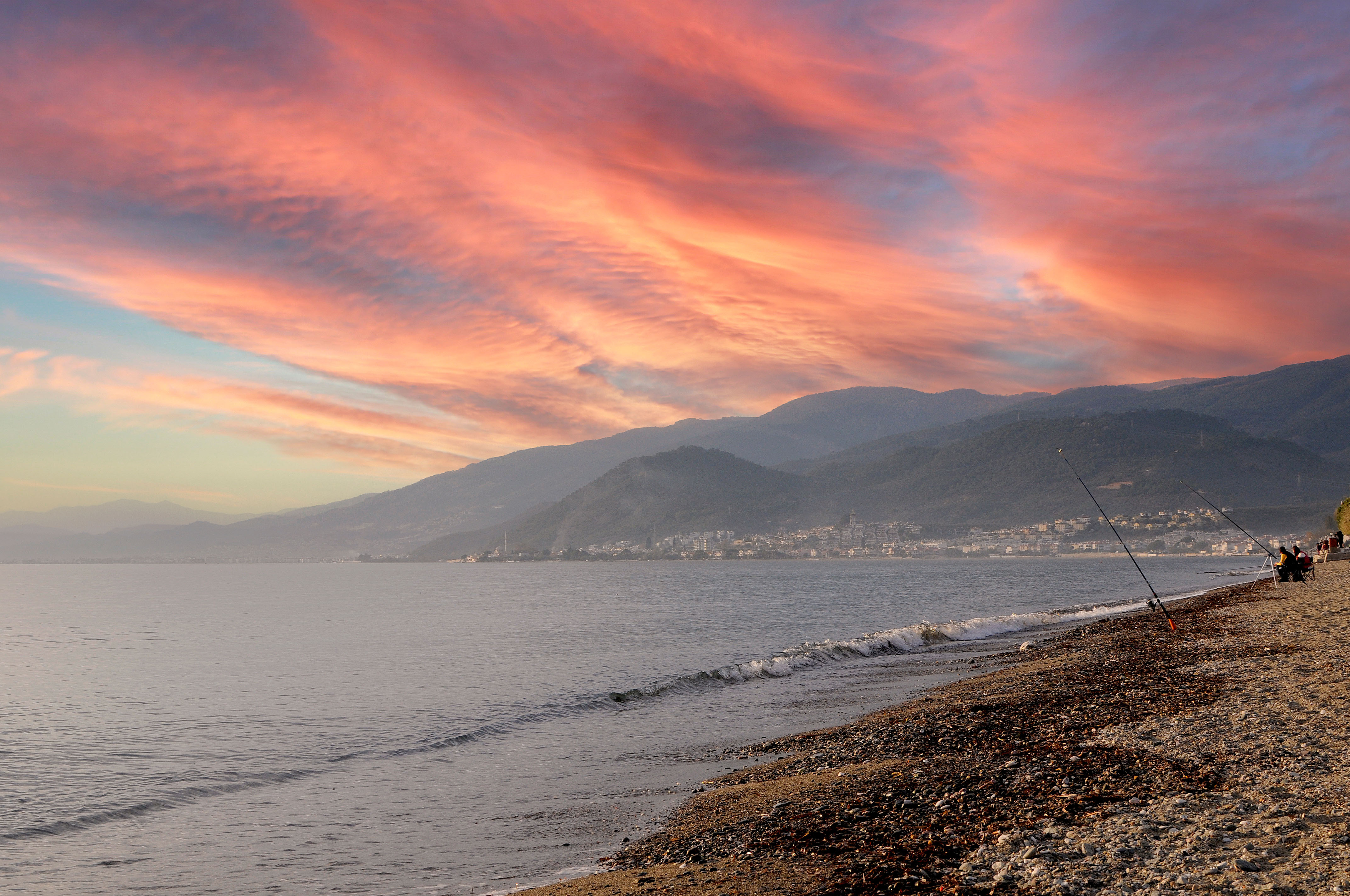 Fener beach with red and purple sunset near Icmeler in Marmaris