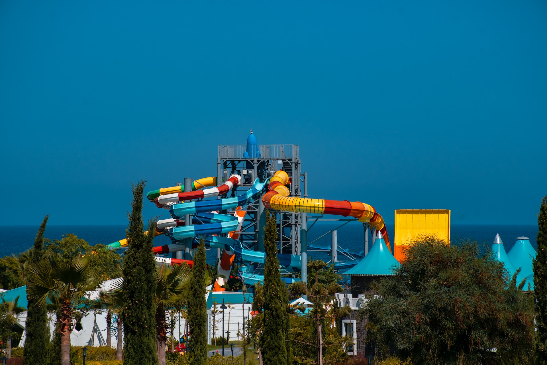 Multicoloured waterslides from a distance