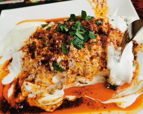 Delicious food served on a white plate