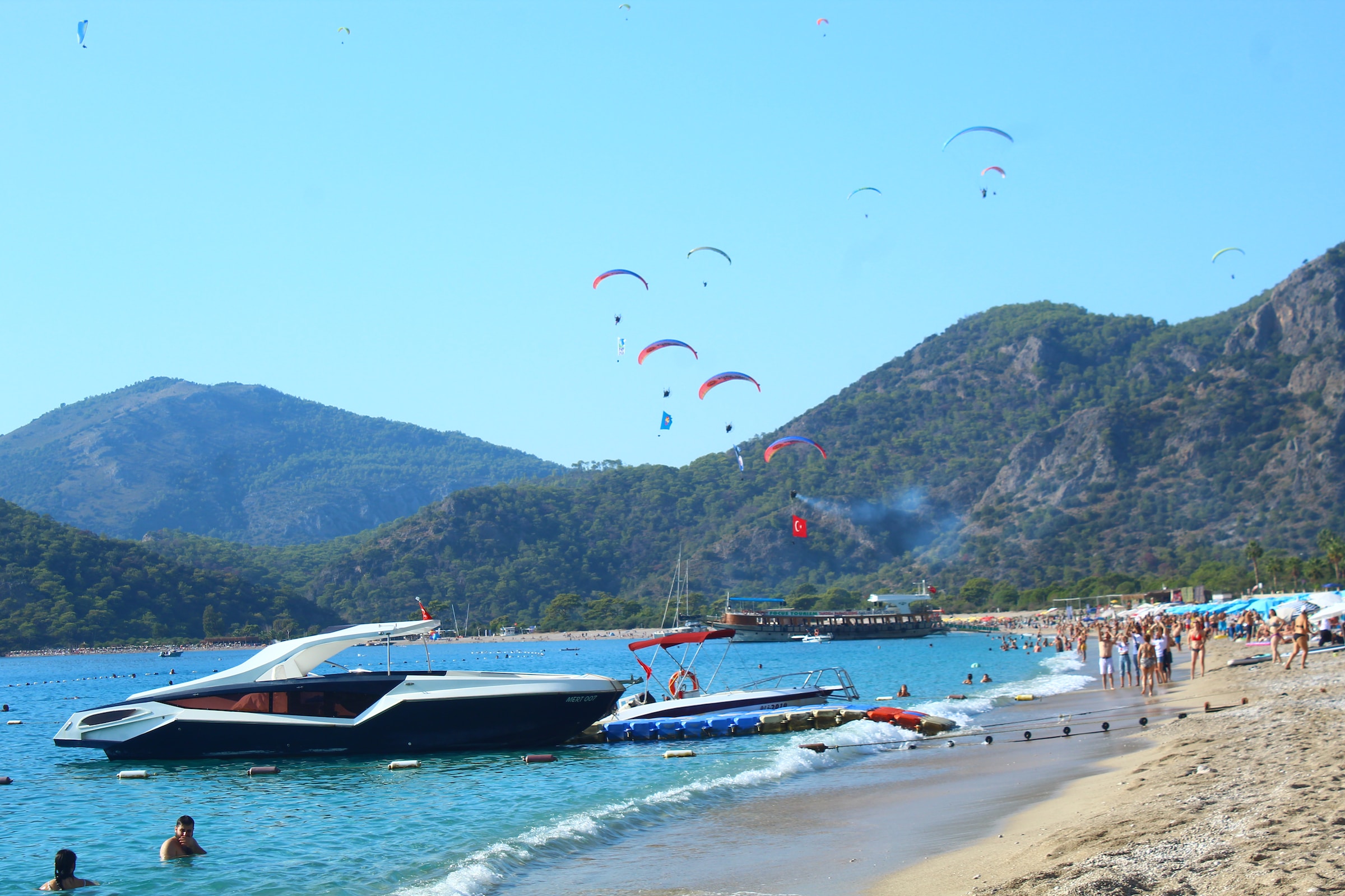 A luxury yacht parked on the front of a bay