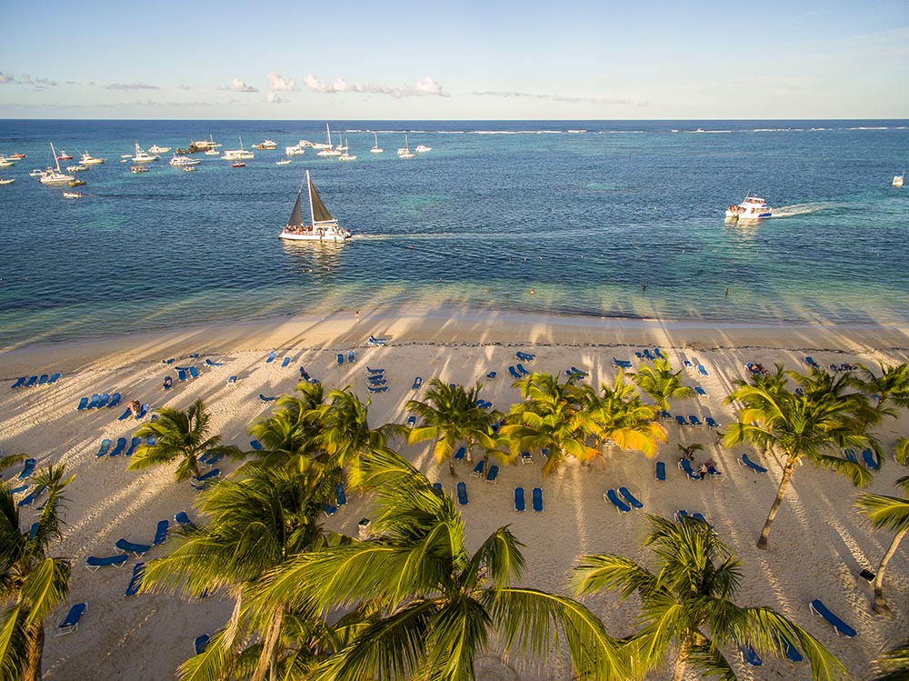Sunbeds laid out on sandy Playa Bavaro beach