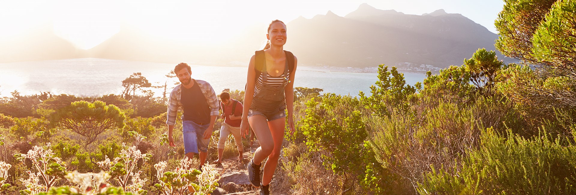 Walking in the verdant mountains by a beautiful lake