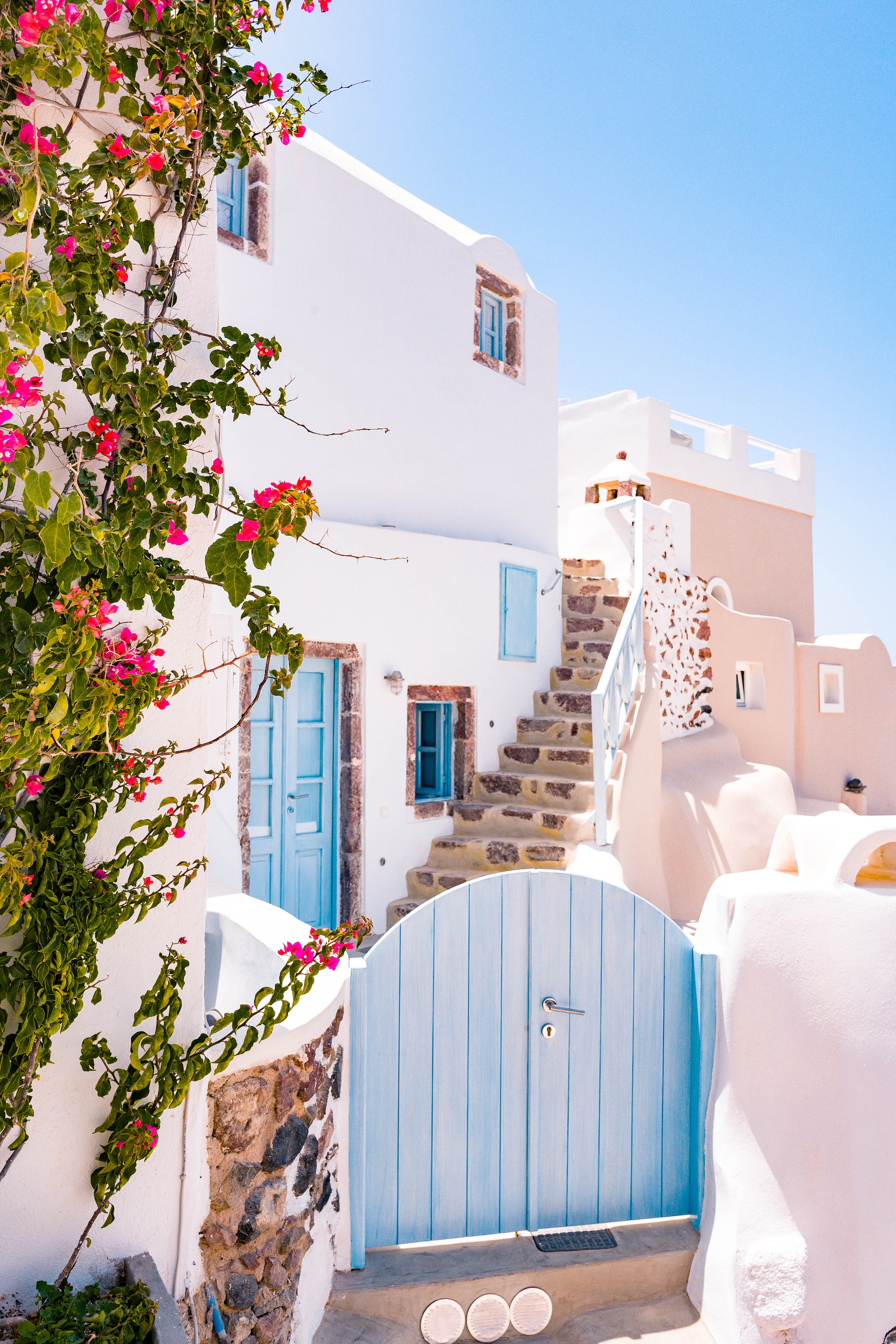 Charming streets of Santorini with flowers