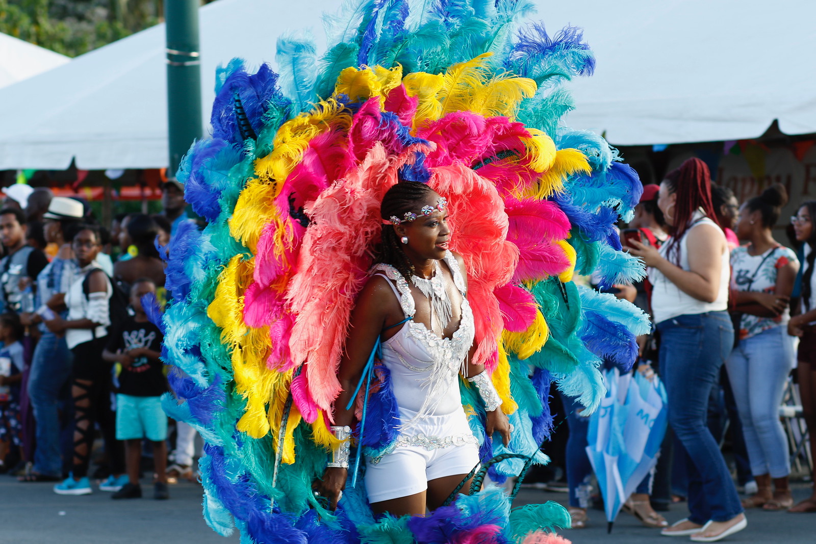 Woman dresses in colourful carnival outfit 