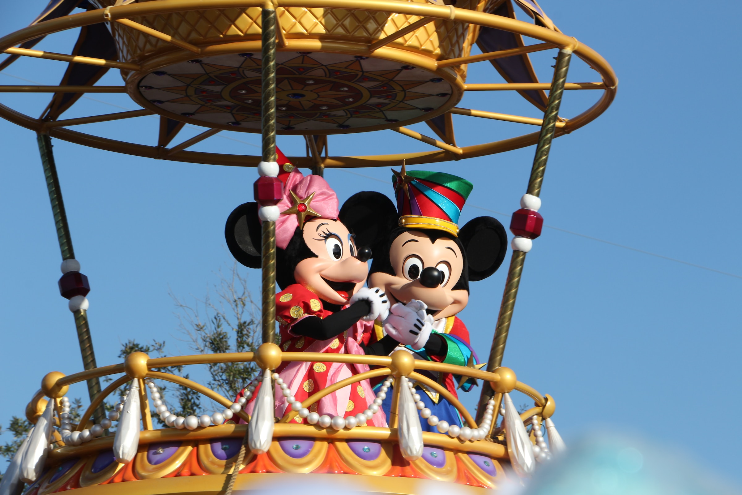 Mickey and Minnie mascots in a hot air balloon