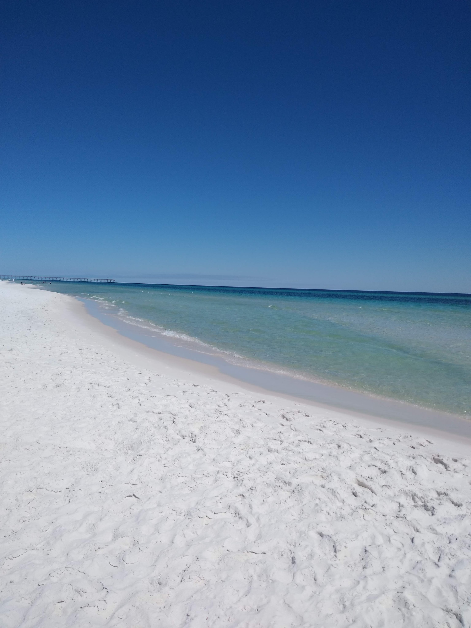 A vast, white-sanded beach of Pensacola 