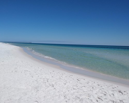 A vast, white-sanded beach of Pensacola