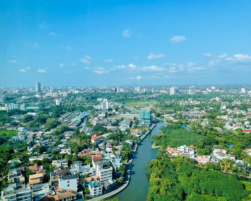 Aerial view of a city with a river running through the middle