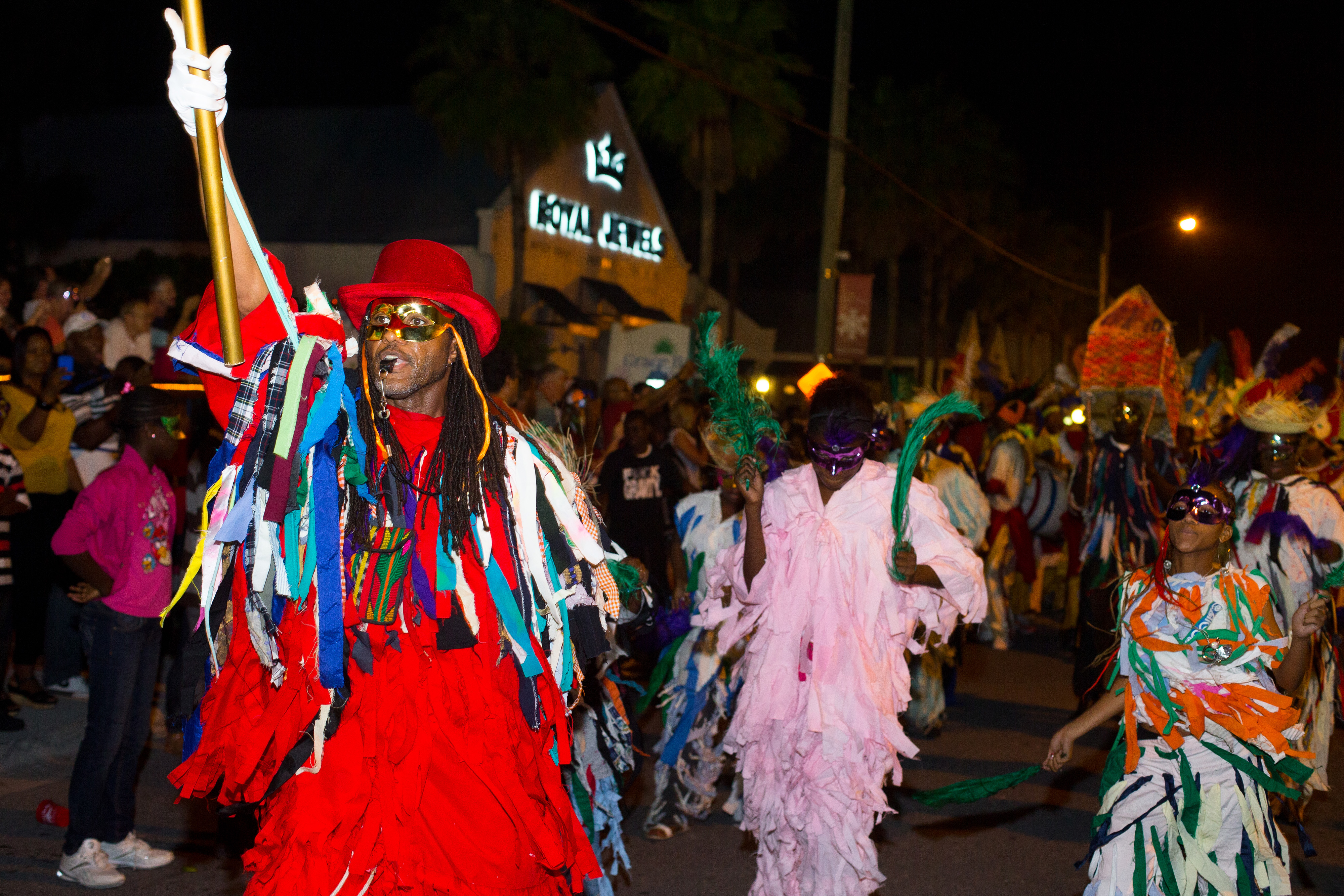 Man dressed in bright red costume for Maskanoo Carnival in Turks And Caicos