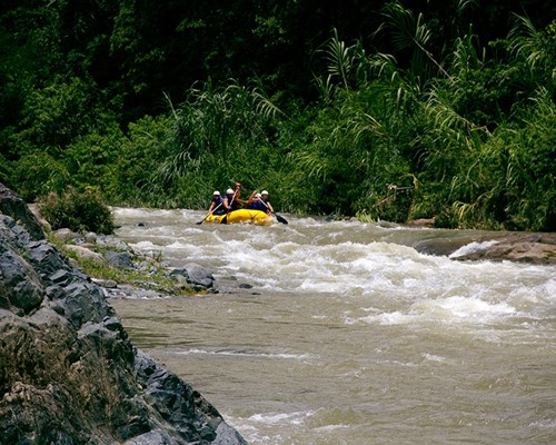 A group of people water rafting in Jarabacoa