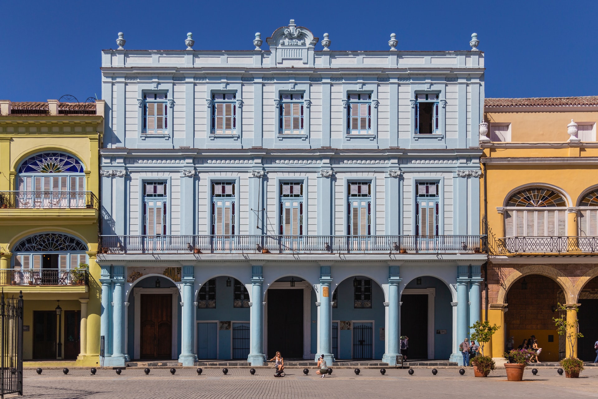 Traditional blue building with striking archways in Havana town centre