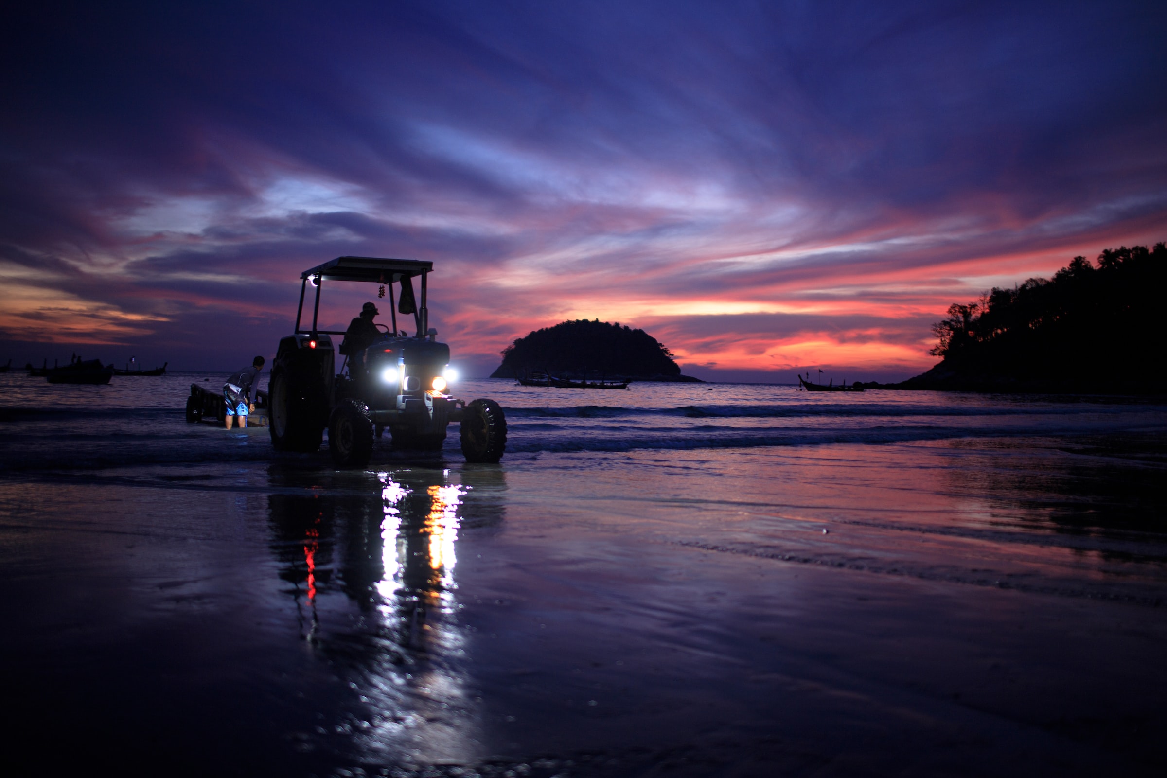 Tractor on Kata Beach at night