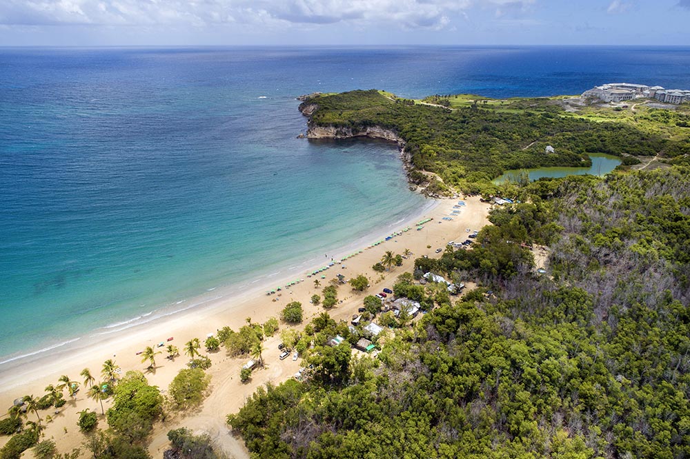 Aerial view of the beach and headland at Playa Macao