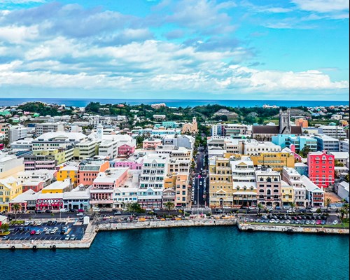 Aerial view of an island edge of a town with colourful buildings